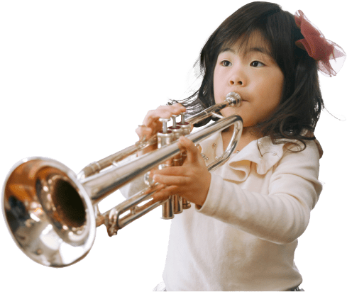 little girl playing trumpet